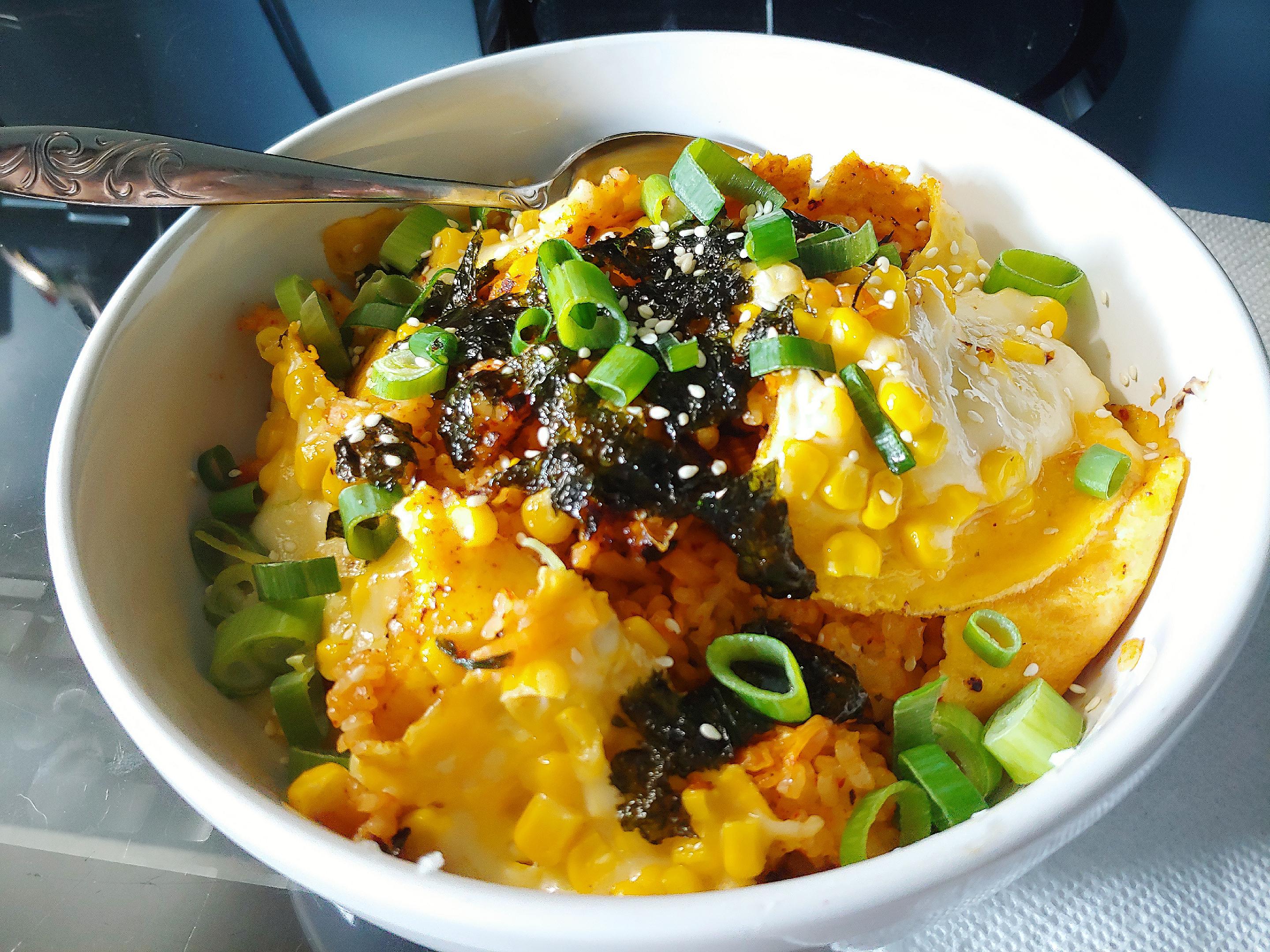 kimchi fried rice hiding underneath toppings 🌷 | Scrolller