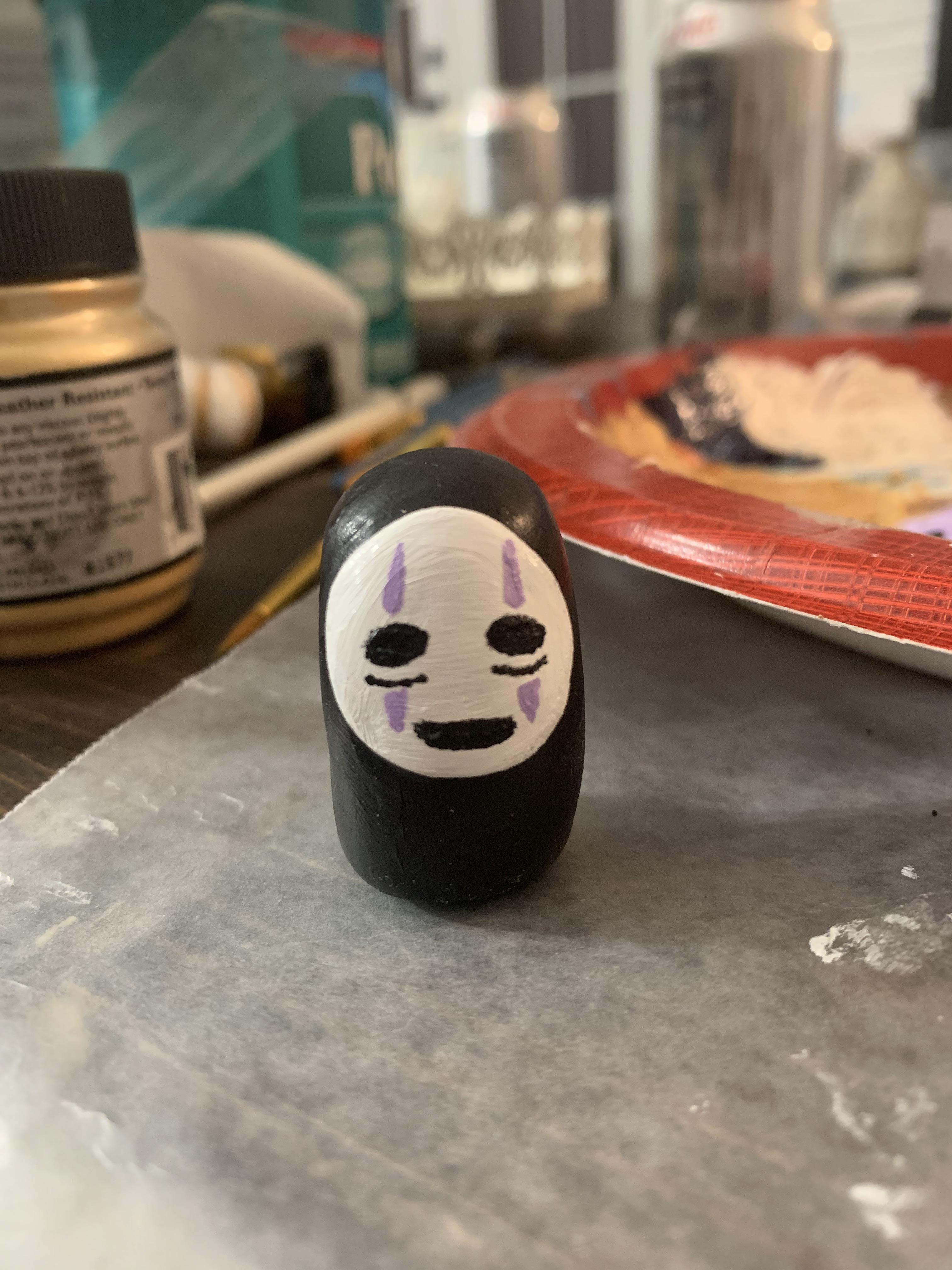 Little polymer clay No-Face | Scrolller