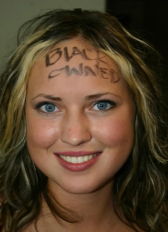 Mixed raceplay body writing and signs featuring Black and white women from JesusRaves