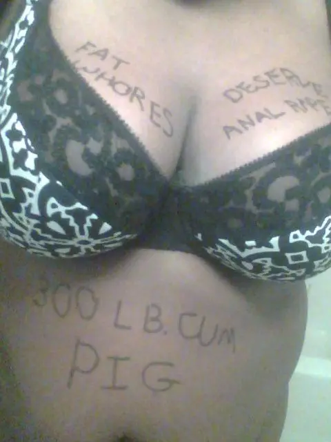 Mixed raceplay body writing and signs featuring Black and white women from JesusRaves