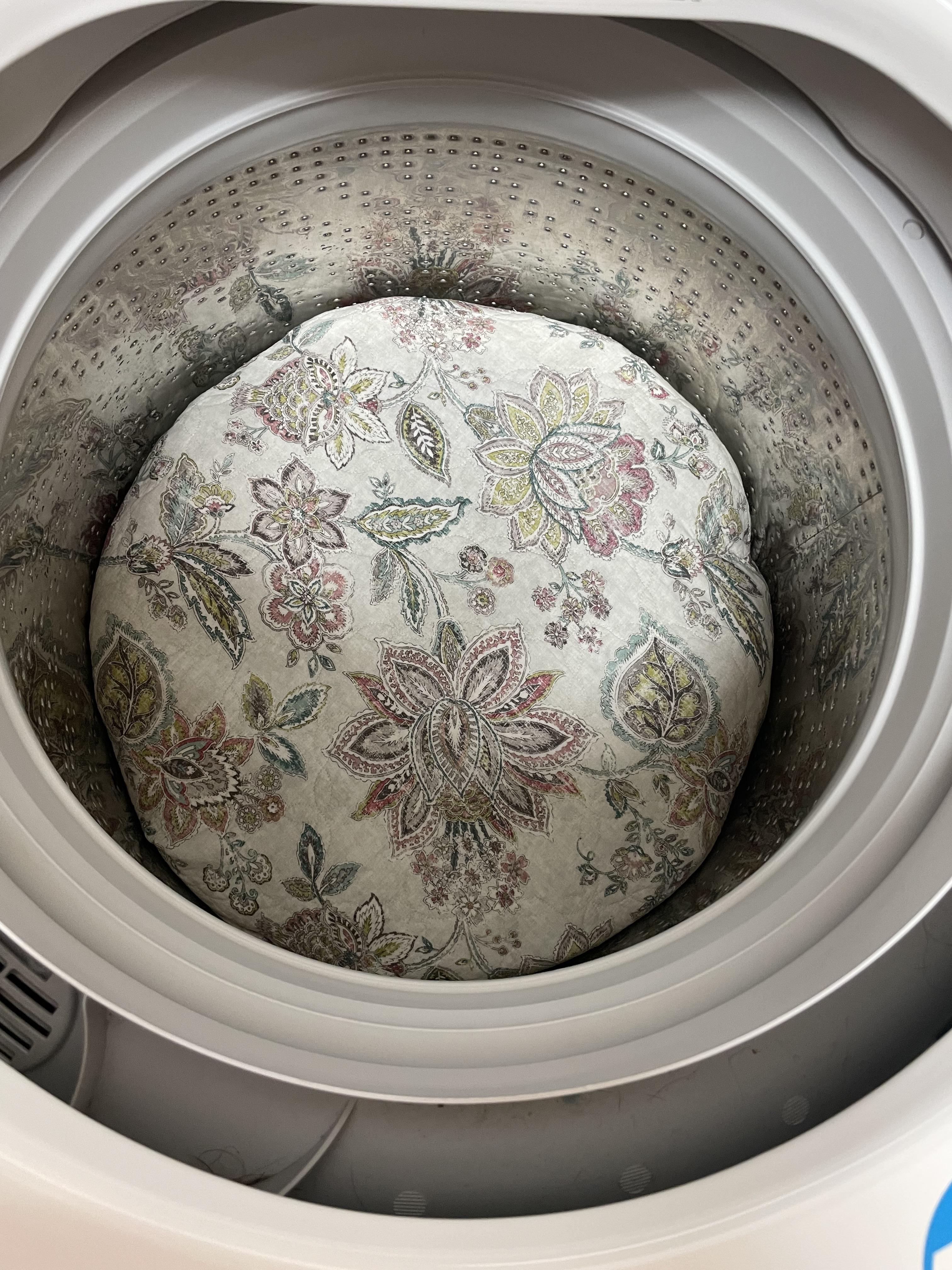 My quilt in my mom’s gigantic washing machine Scrolller