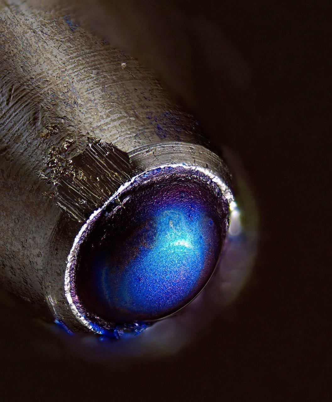 New ballpoint pen under the microscope. Scrolller