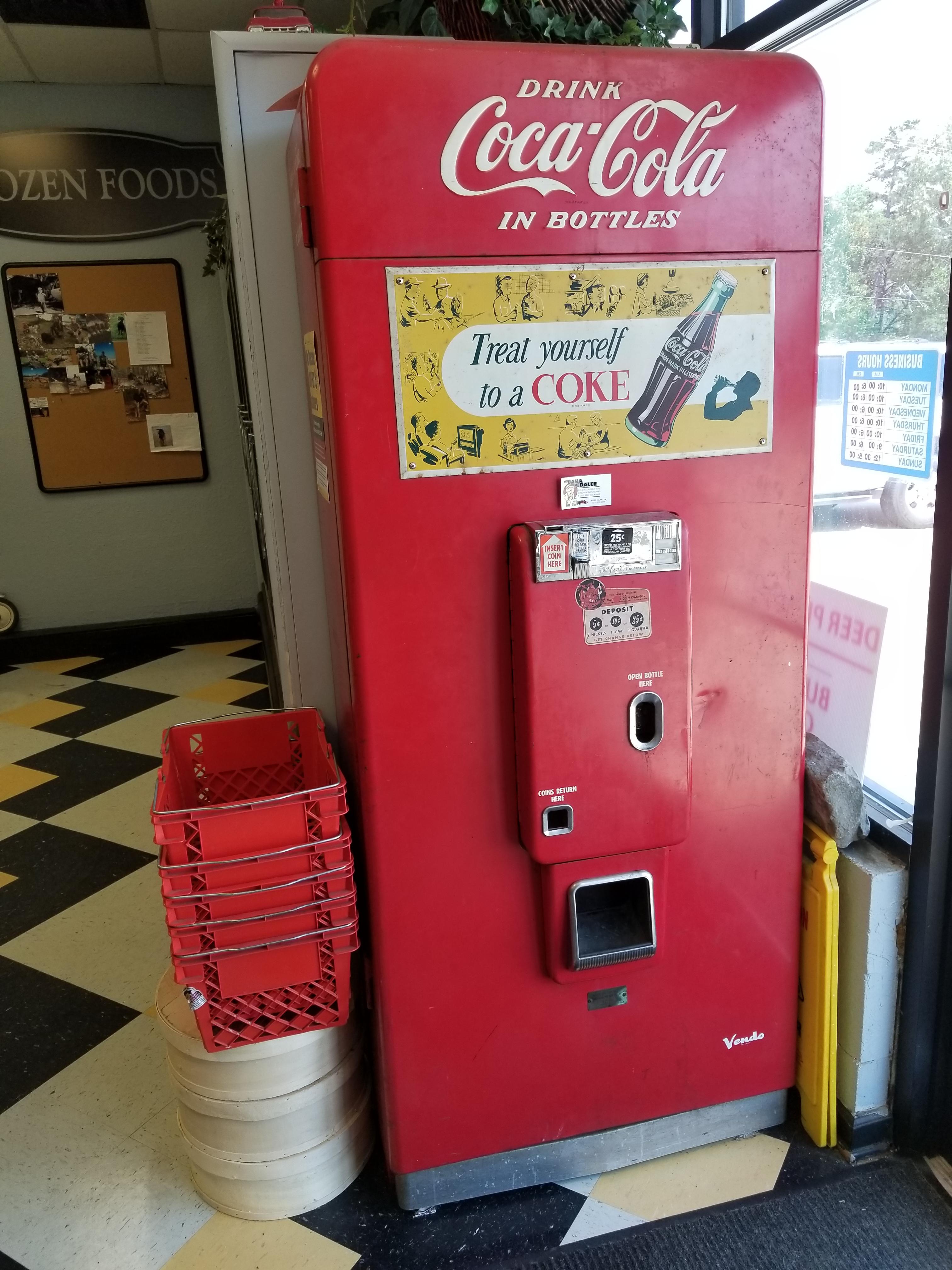 Old coke machine that's still working. Scrolller