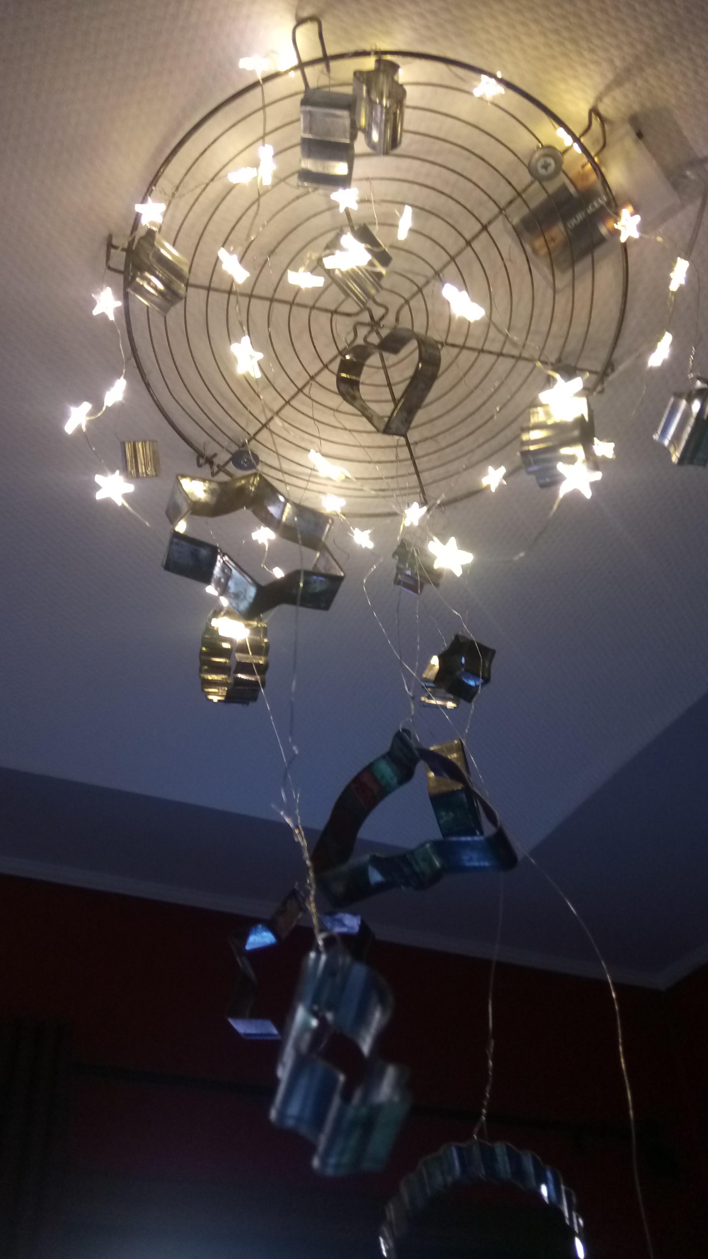 Old cookie cutters, and old cake rack and some Christmas lights ...