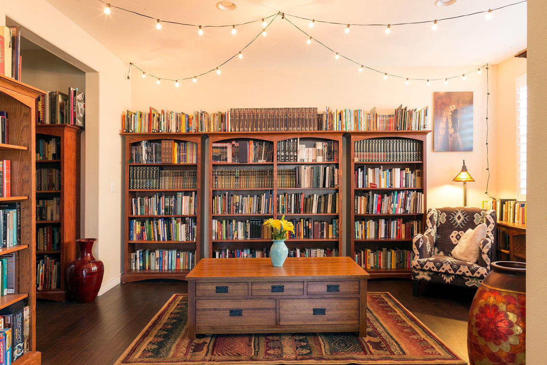 Our very modest home library. Many angles and another room not visible ...