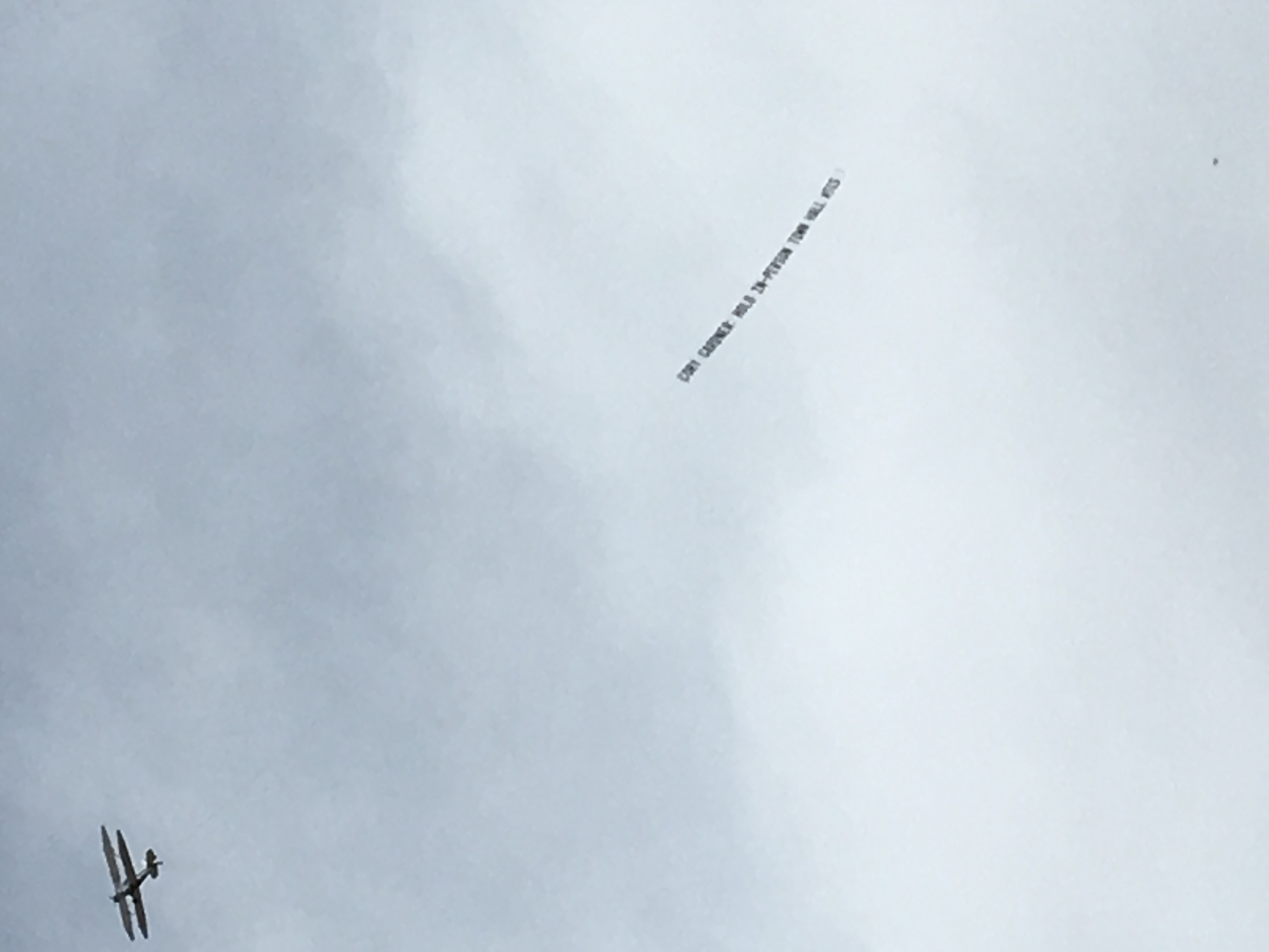 plane-circling-over-rockies-opening-day-crowd-cory-gardner-hold-in