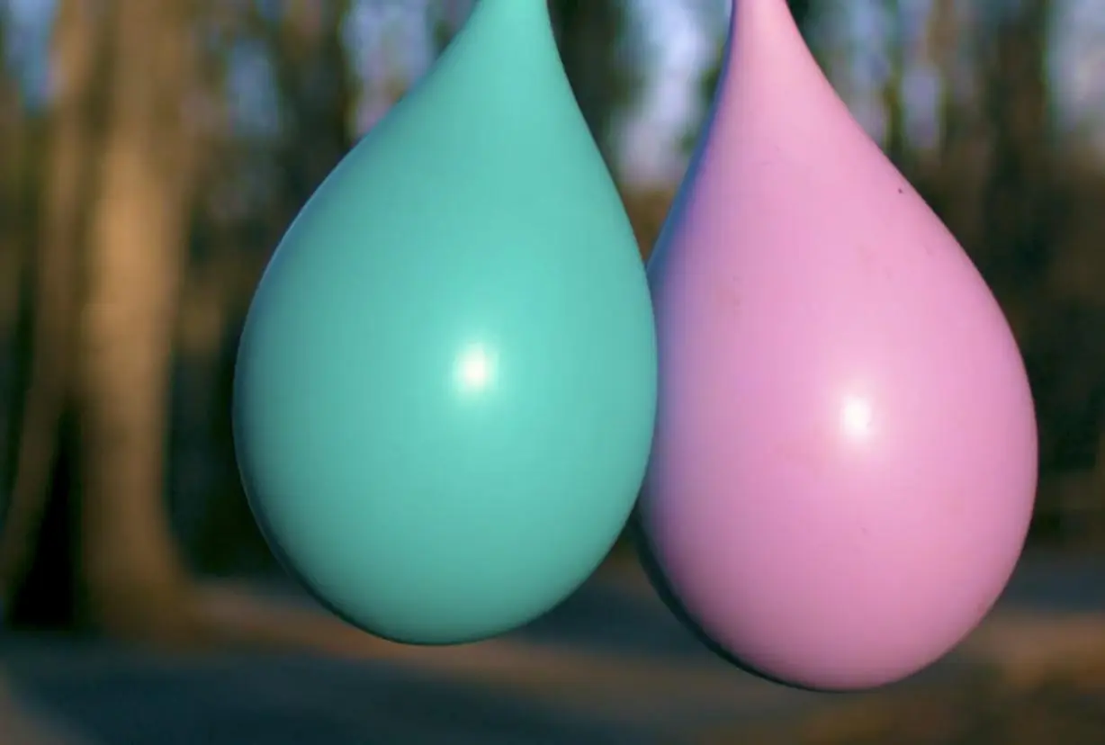 Poorly-timed photo of 2 water balloons being burst