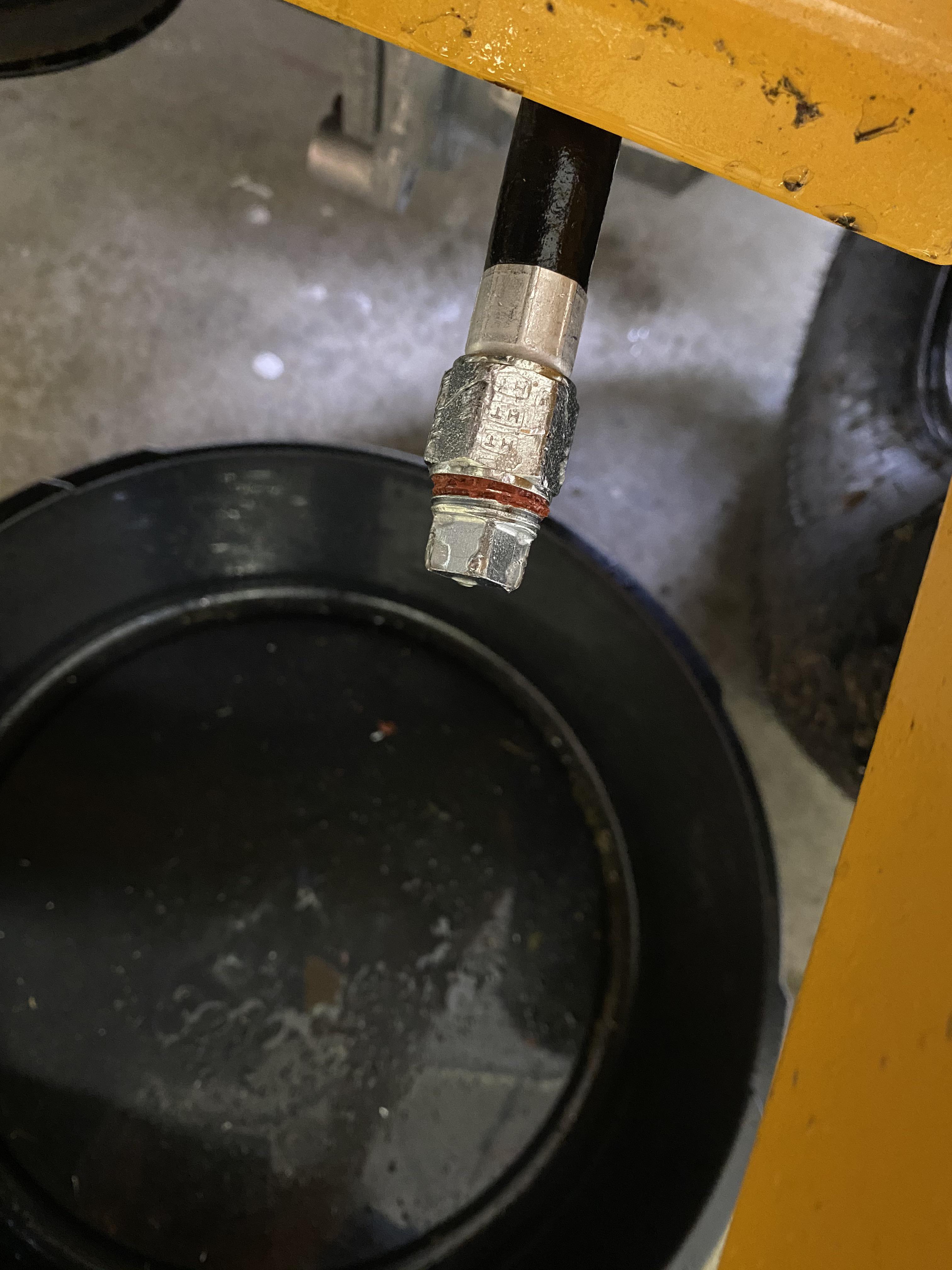 Red Loctite on my oil drain plug? From the factory? Cub says call