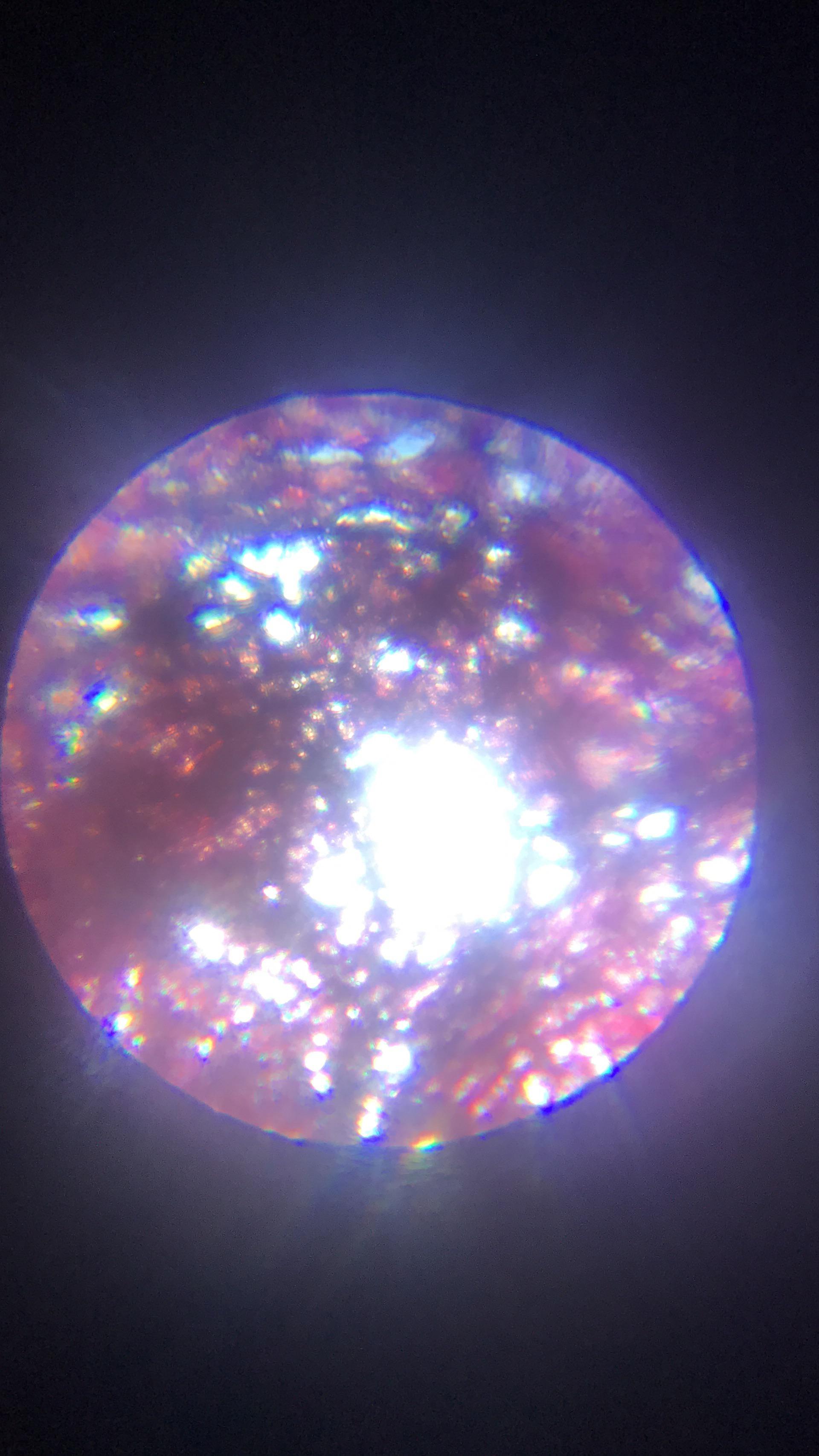 Red tissue paper under a microscope Scrolller