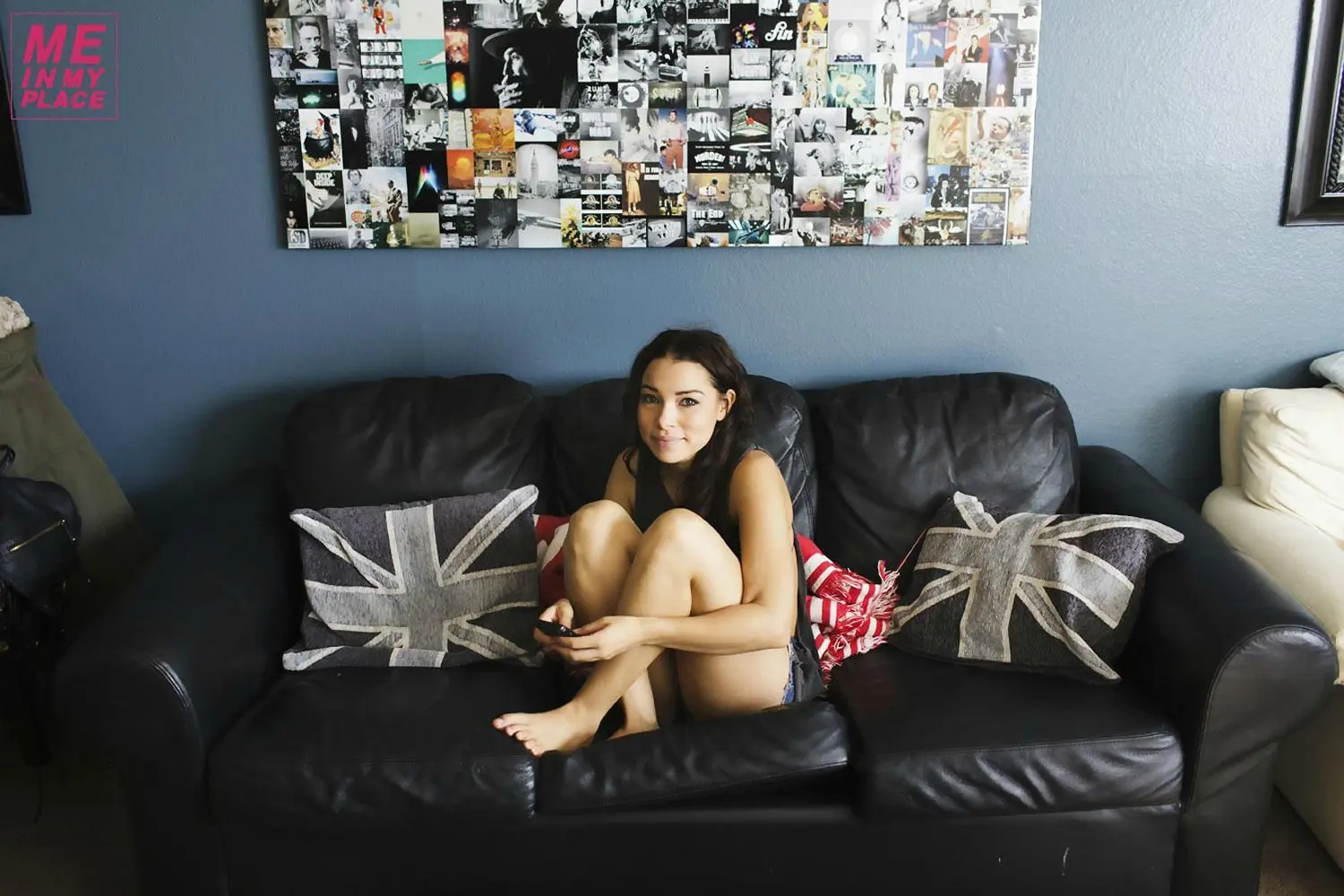 Jessica Parker Kenney in tank tops and denim shorts posing in a New York City living room and bathroom
