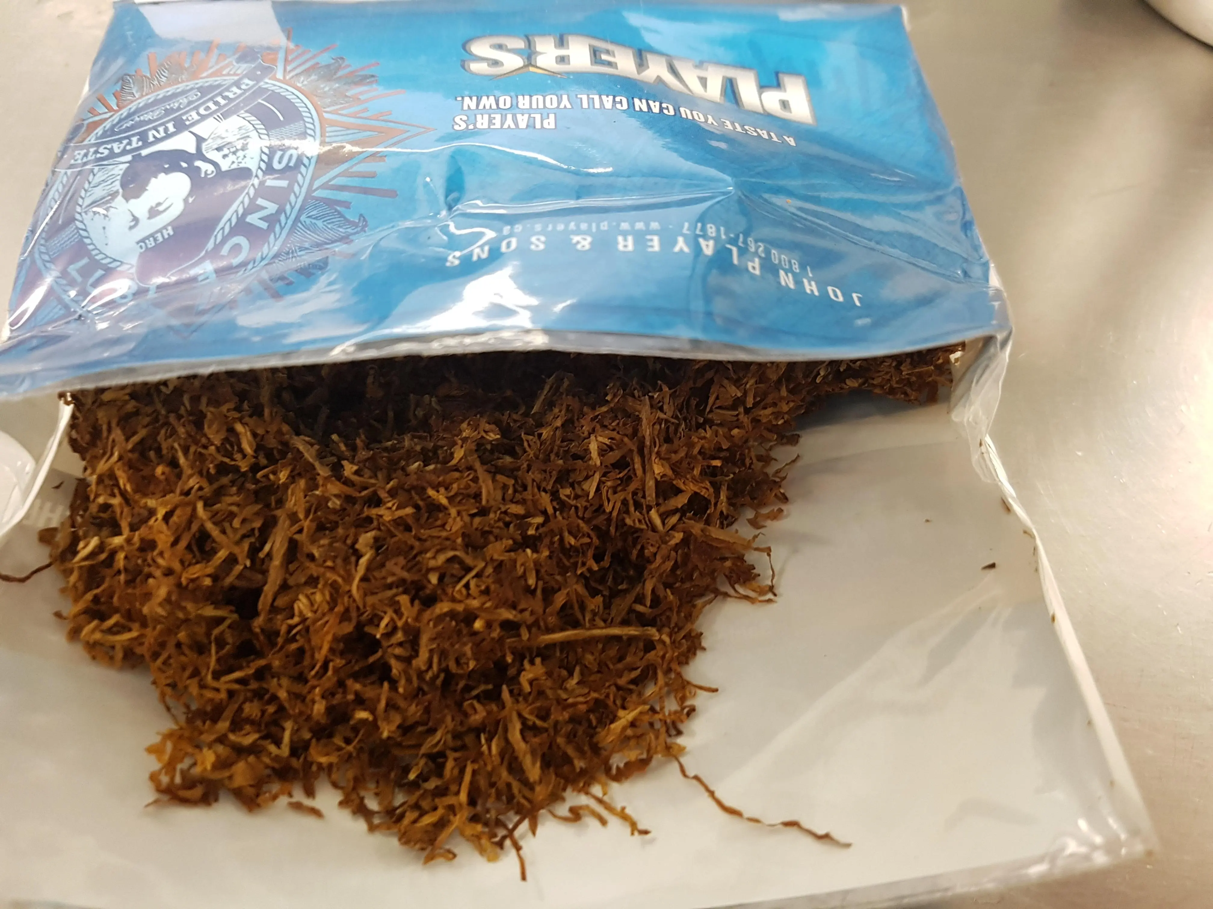 Tobacco colour off? First pouch of Player's and seems darker than other ...