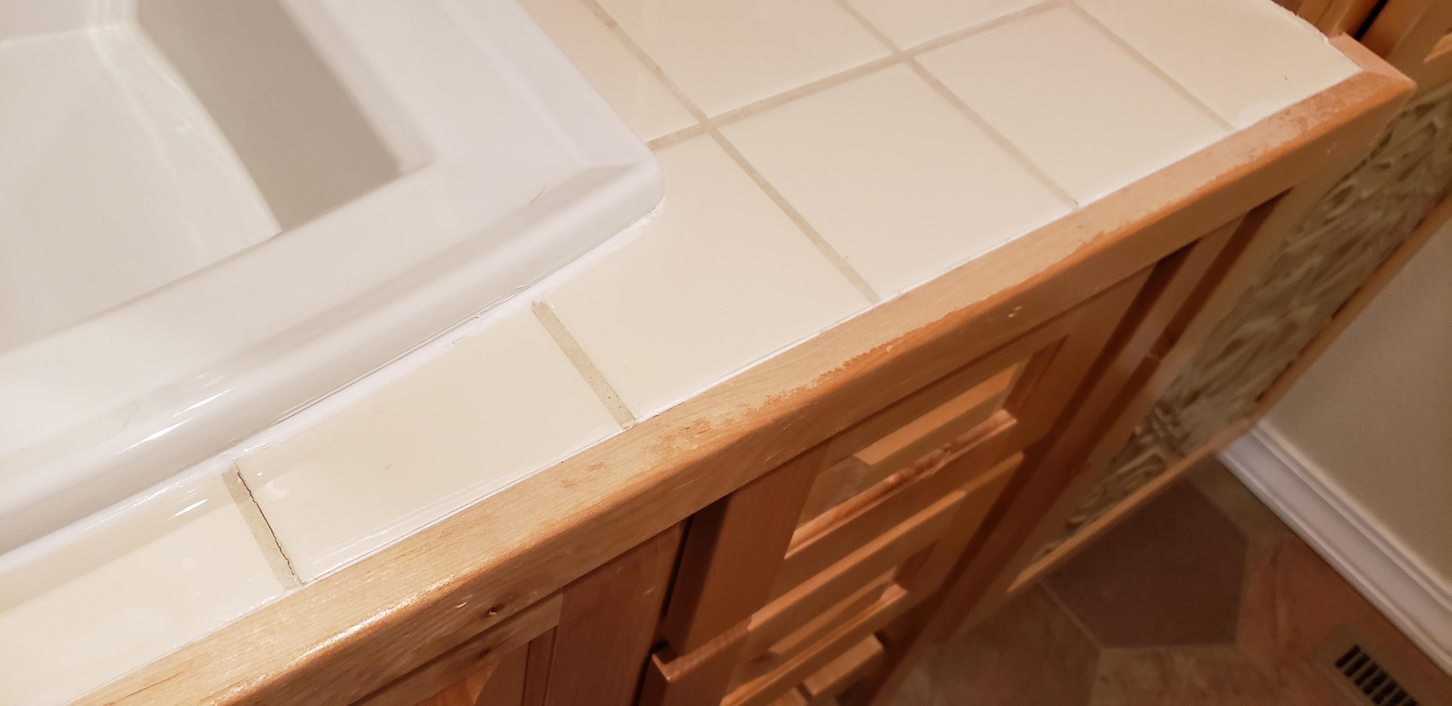 What is the best finish for my bathroom vanity? Teak oil? Wiping