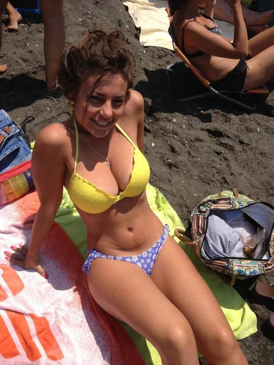 Laying in a yellow bikini