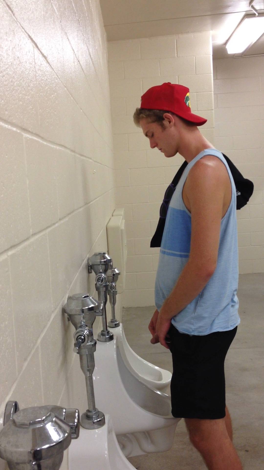 Young Guy Preparing To Piss Scrolller