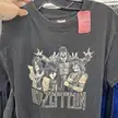 Jimmy Page and Led Zeppelin on a black graphic t-shirt with a 2.99 price tag
