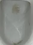 what are these stains on my toilet bowl and how can I remove them?