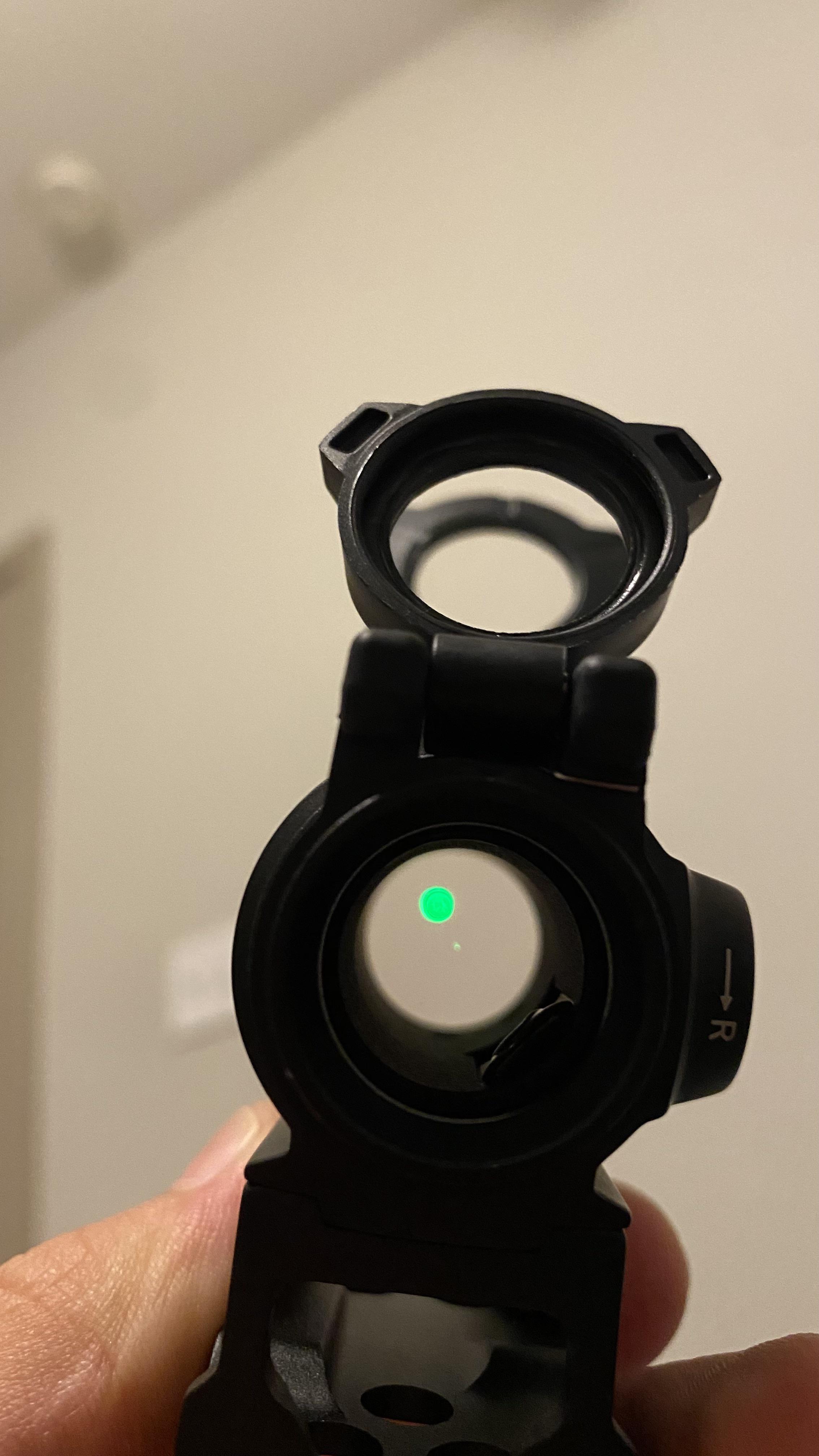 Hey guys, I was wondering if this is normal, an extra smaller dot in my dot sight? the reticle isn’t a perfect dot which is more noticeable as you make it bigger, but still slightly