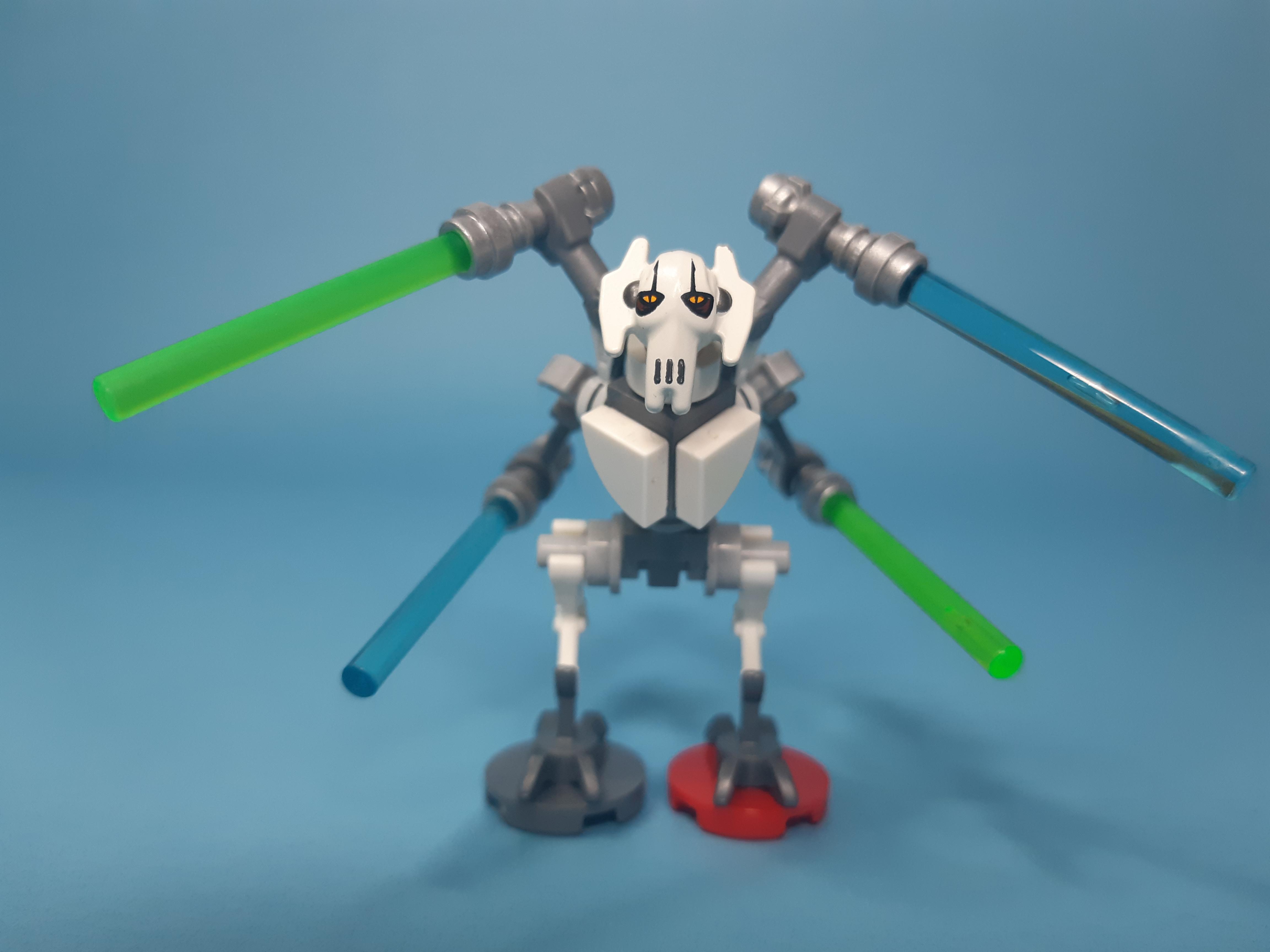 Custom General Grievous LEGO figure with and without four lightsabers against a blue background