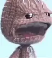 What's the origin of the meme with the little big planet dude spinning with a disgusted face?