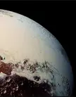Sputnik Planum (Pluto) - This high-resolution image captured by NASA's New Horizons spacecraft combines blue, red and infrared images taken by the Ralph/Multispectral Visual Imaging Camera (MVIC). The bright expanse is the western lobe of the "heart," informally called Sputnik Planum