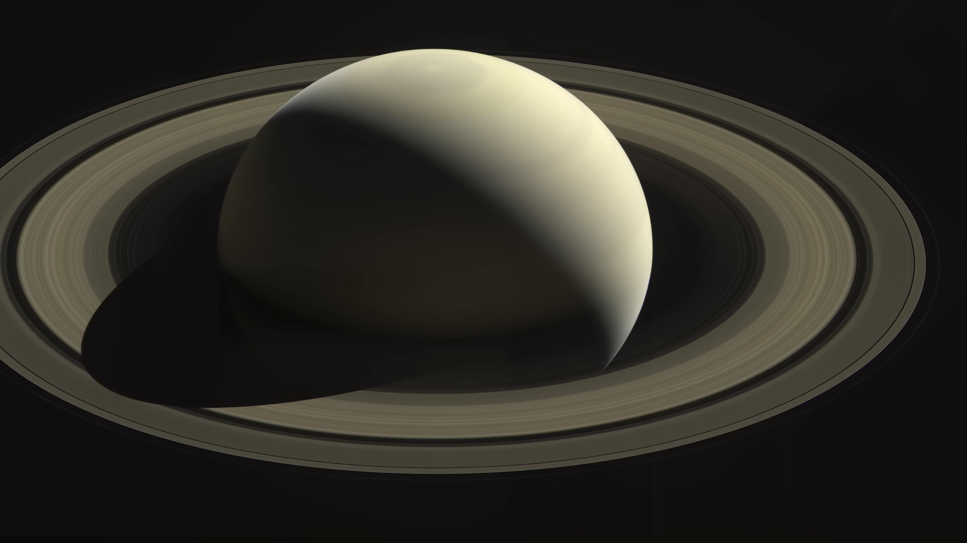 A real photo of Saturn. Cassini's cameras captured views in color by taking 3 images, each with a different color filter, which were then combined back on Earth. The resulting images show us Saturn as our eyes would see it.