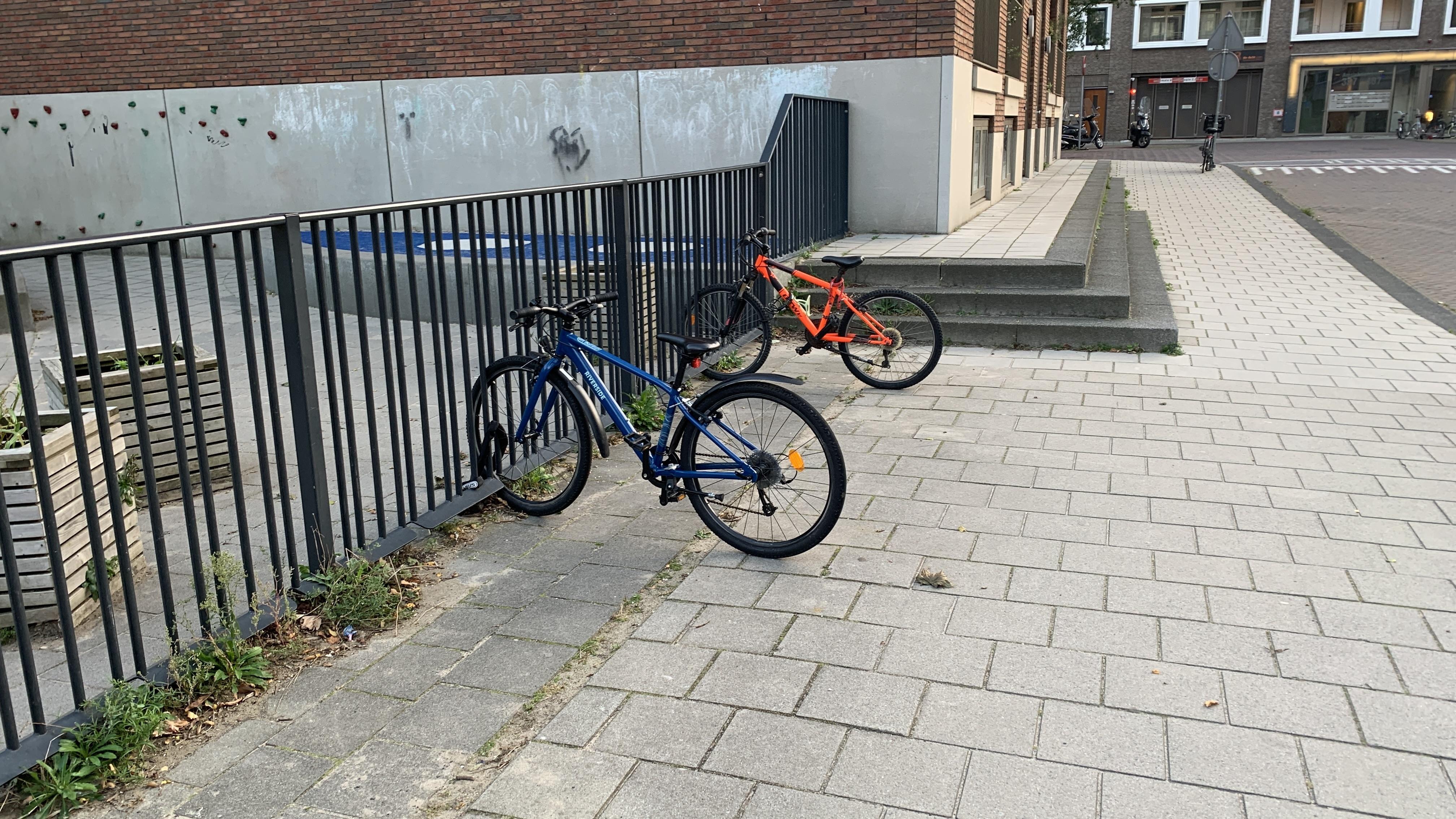 Fence doubles as a bike rack. Amsterdam, NL | Scrolller