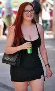 Busty Redhead enjoys flaunting the Big Tits