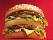 Why exactly is there a piece of bread in the middle of a Big Mac? I always found this odd, absolutely no other burger is like this