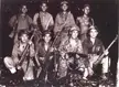 USMC Native American Code Talkers on Bougainville, December 1943. (L-R front): Pvt Earl Johnny, Pvt Kee Etsicitty, Pvt John V. Goodluck, and PFC David Jordan. Rear L-R: Pvt Jack C. Morgan, Pvt George H. Kirk, Pvt Tom H. Jones, Cpl Henry Bake, Jr.