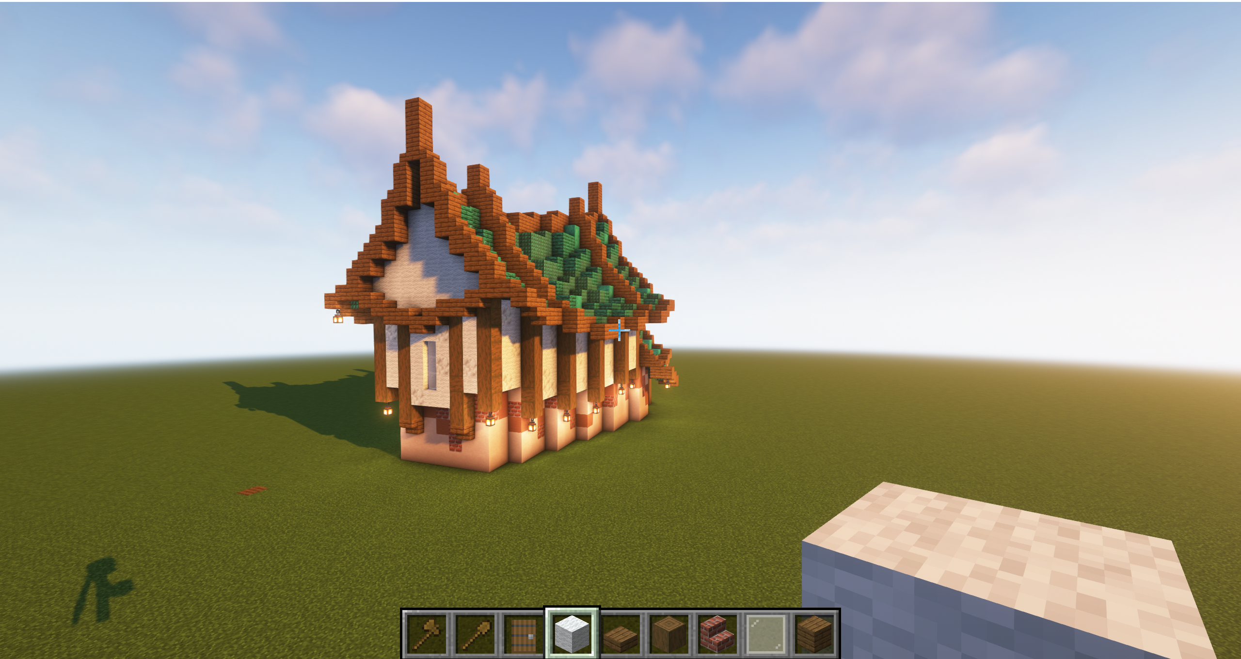Japanese minecraft builds featuring a traditional East Asian style house with a green roof and wooden walls