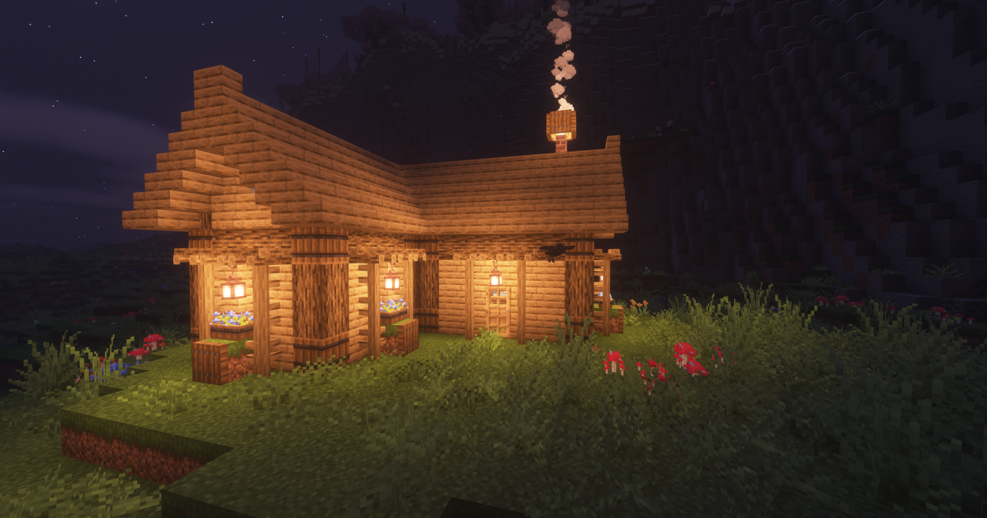 Medium size survival hut in Minecraft with lanterns and interior furniture