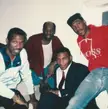 Charlie Murphy, Mike Tyson, Eddie Murphy, and some random guy who looks like he spends most of his free time sleeping on a couch (1993)