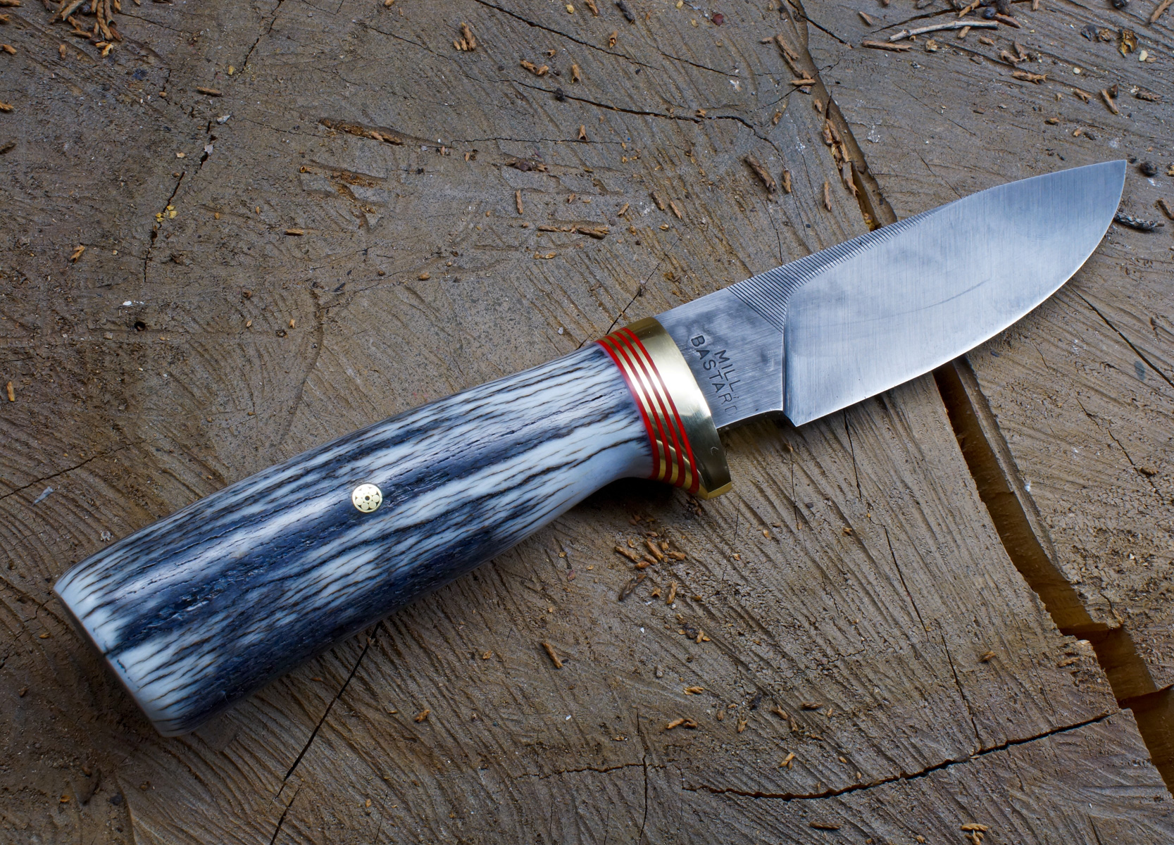 Here's a basic hunting knife. Nicholson file blade with Elk antler ...