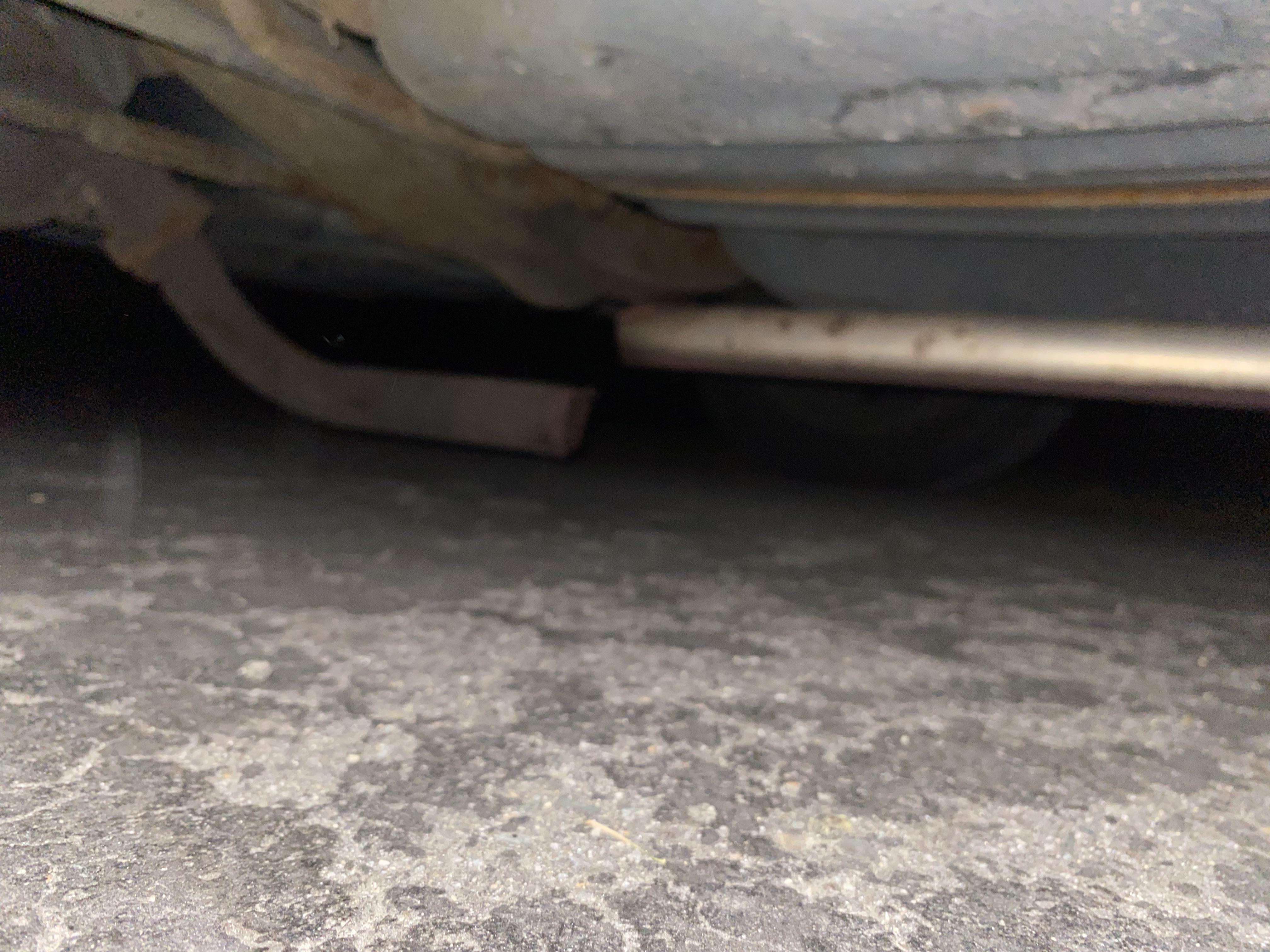 Broken pipe under car