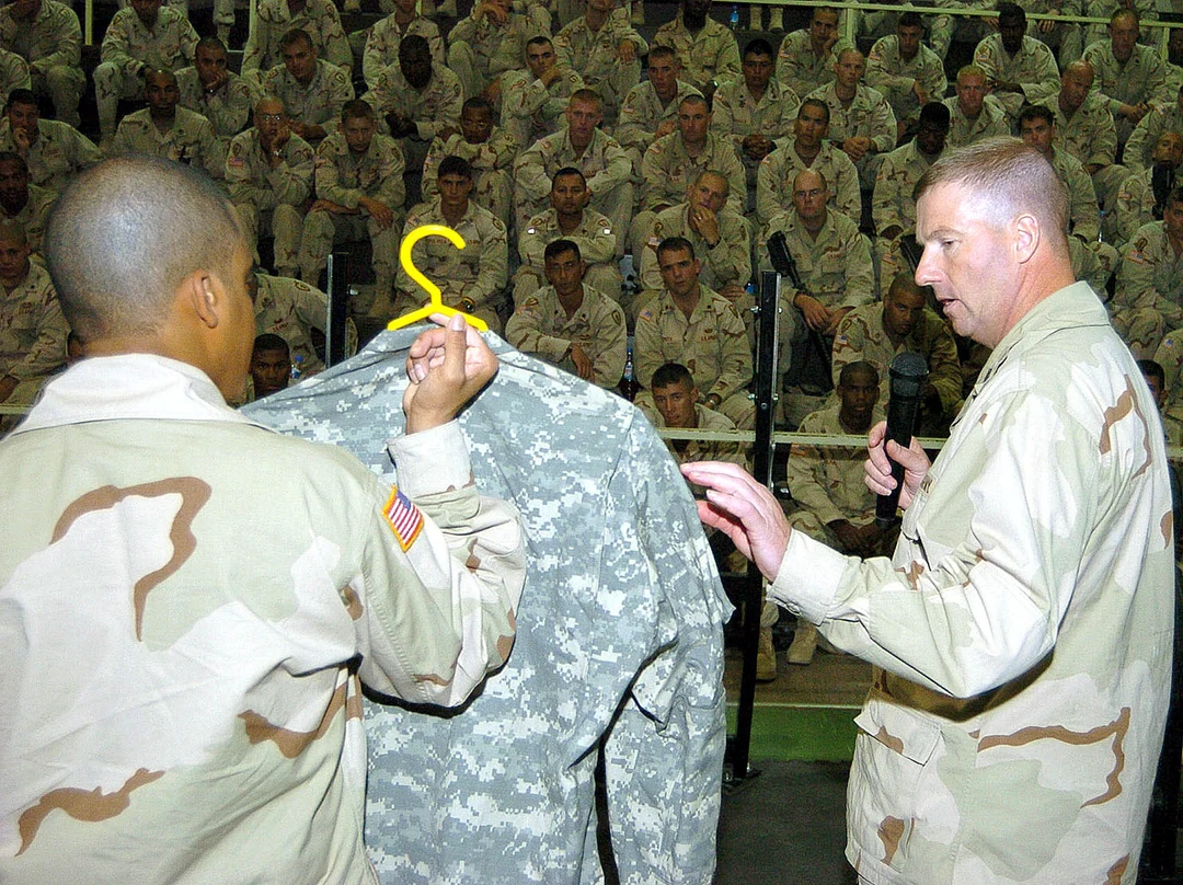 Sgt. Maj. of the Army Kenneth O. Preston shows off the new Army Combat ...