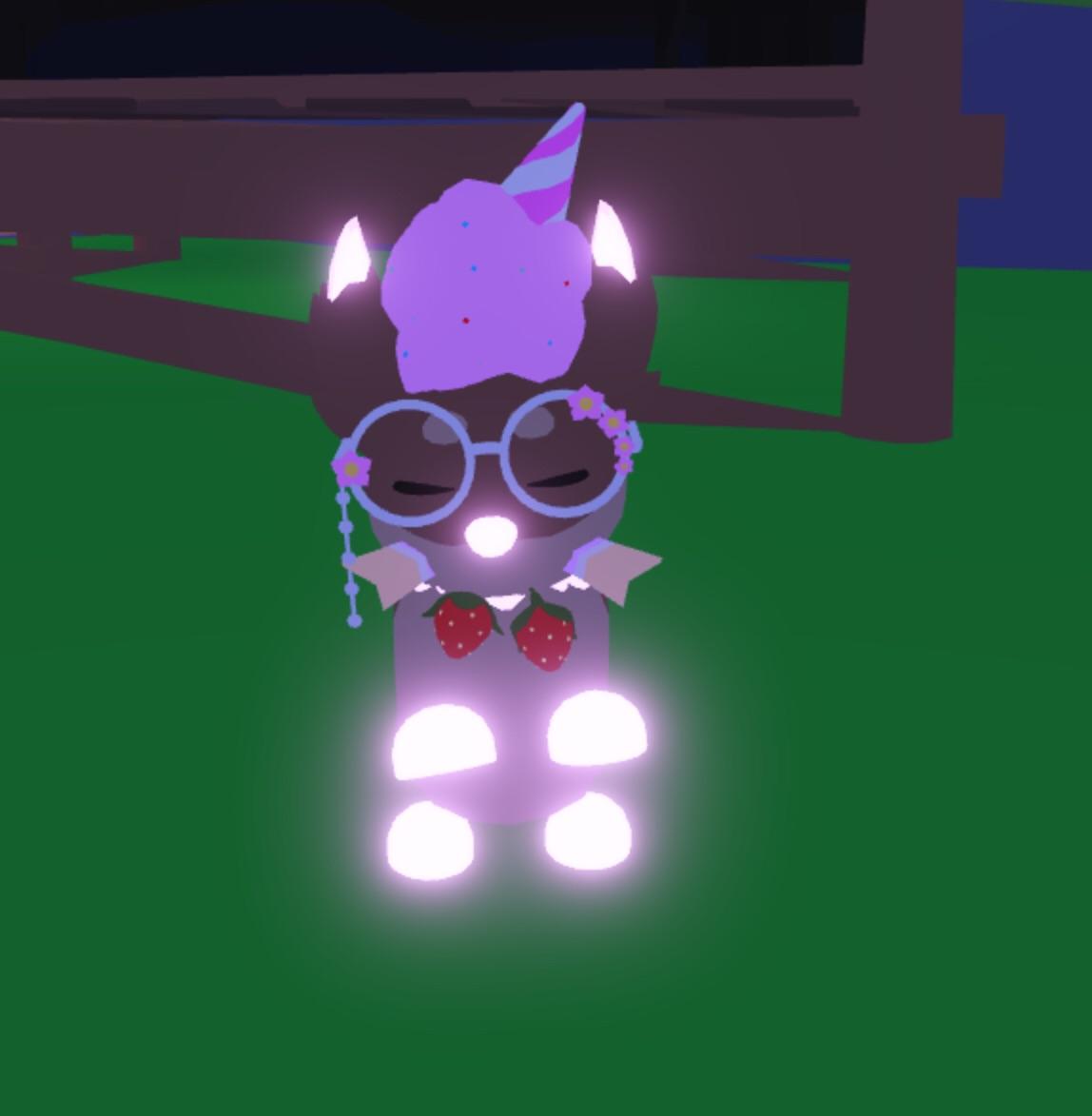 Adopt Me Roblox humanoid avatar with purple hair in a white and black dress and a small purple creature