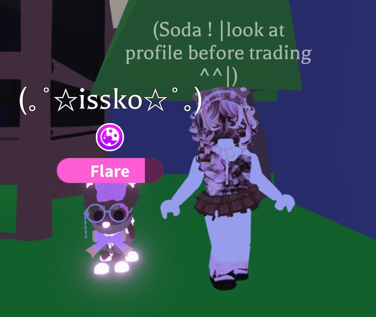 Adopt Me Roblox humanoid avatar with purple hair in a white and black dress and a small purple creature