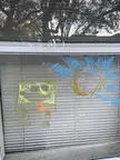 This artistic rendition of SpongeBob and Rick on a window I passed