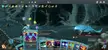 Slay the Spire gameplay showing a character in a blue cloak battling the Defect in a dark cavern.