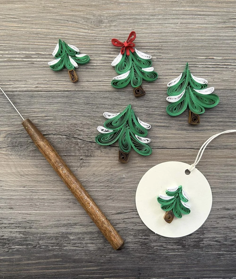 Snowy quilling paper evergreen trees | Scrolller
