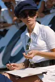 Nina Rindt, wife of Jochen Rindt who was killed during practice at Monza in 1970, recording lap times at the 1969 British Grand Prix