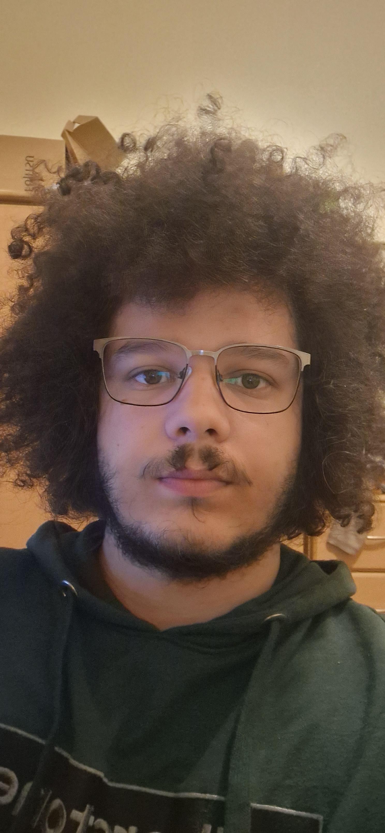 My hair goes really dry, brittle, matted, and knotted like a day or so after last washing it. Is there anything I can use/do to keep it a little more hydrated/a little less frizzy and prone to knotting?