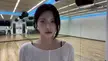 NMIXX Kyujin in a white sheer top performing the 'Look at Me' dance challenge in a studio