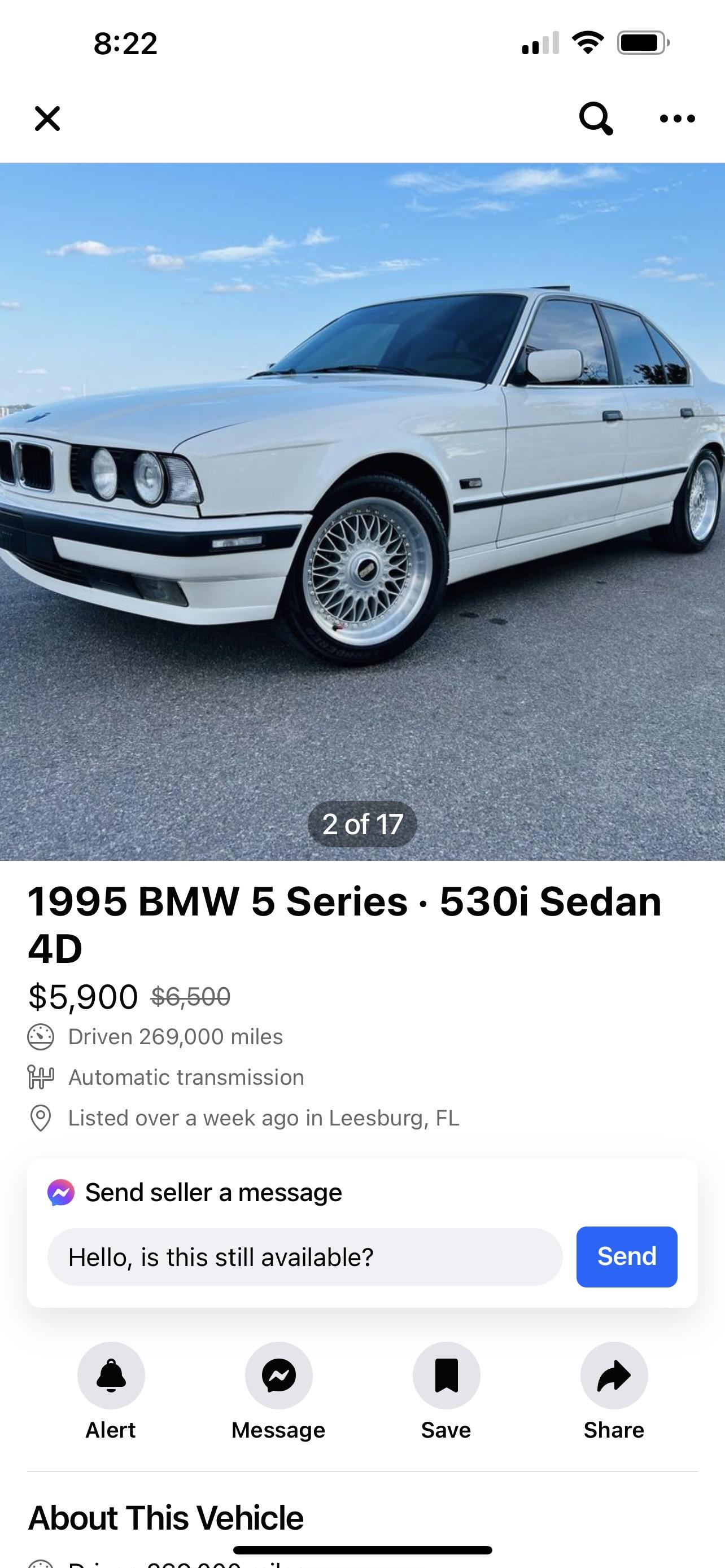 A white 1995 BMW 5 Series 530i Sedan listed for $5,900 on a smartphone screen.