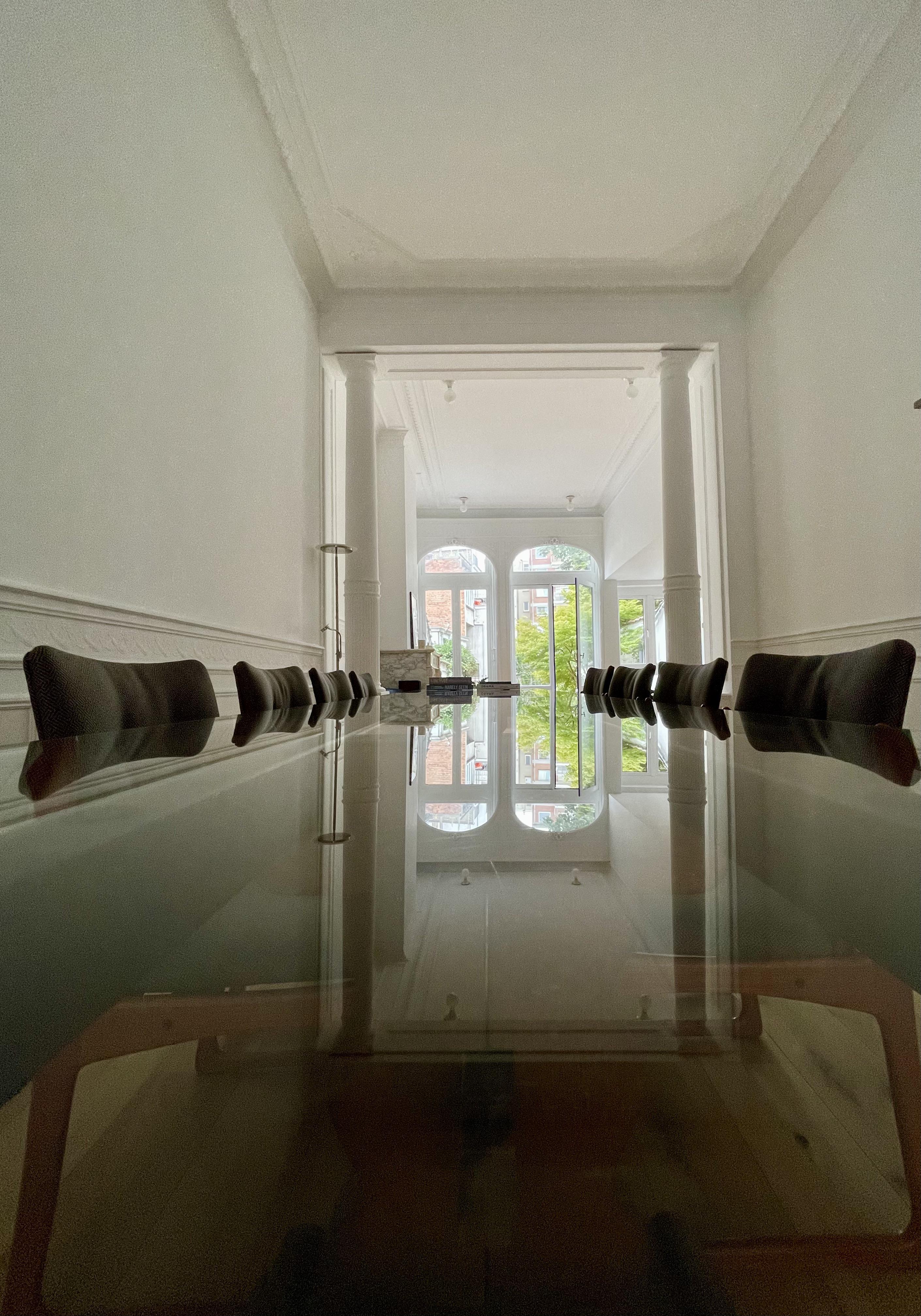 The reflection on this dining table