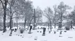 After a surprise snow storm at Lakeview Cemetery in Howell, MI