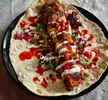 Chicken Kebab cooked with a coal fire in an Ooni pizza oven [OC]