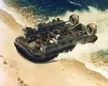 Landing craft air cushion (LCAC) landing on a beach by J. J. Carr