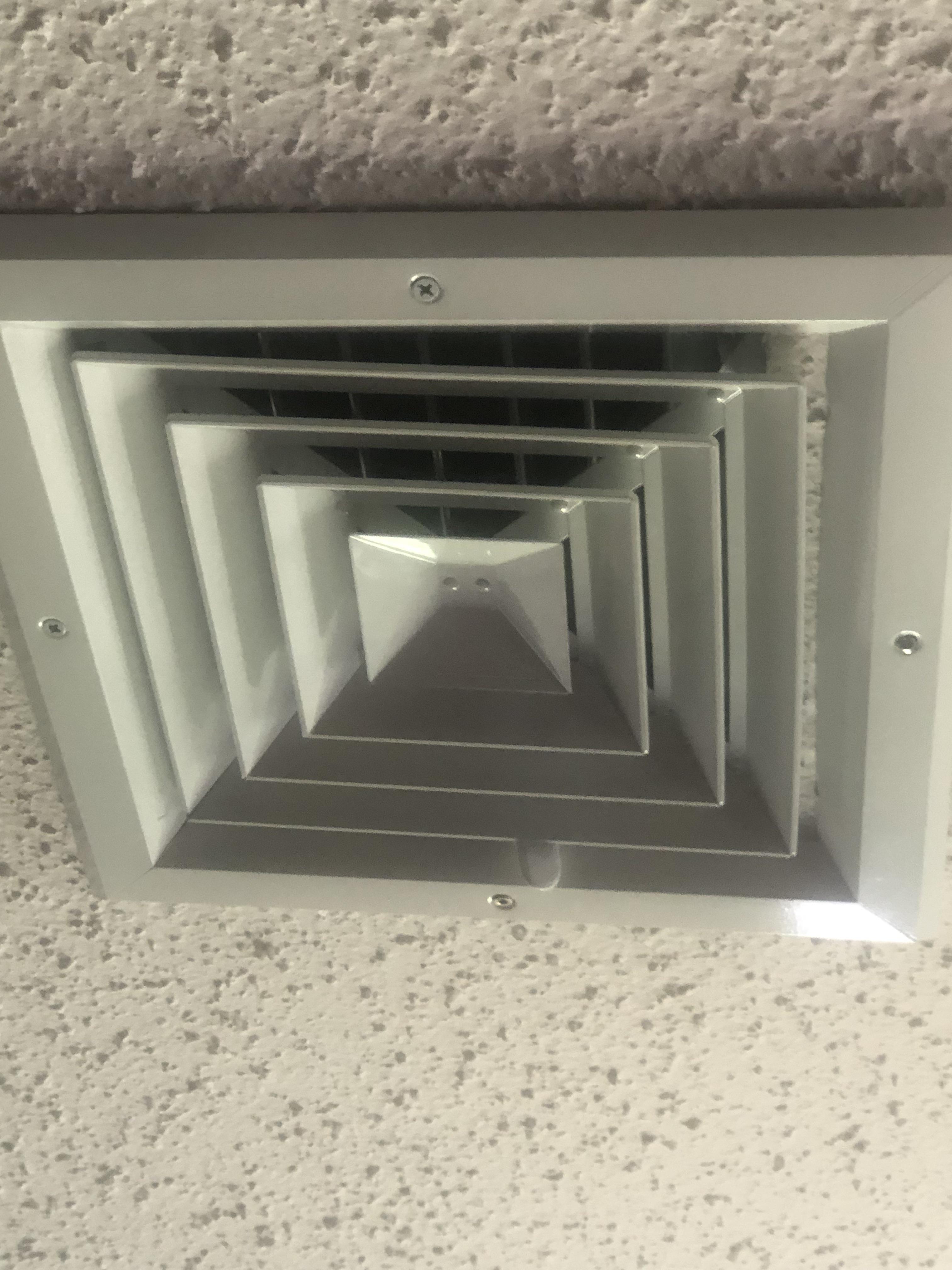 The ceiling extents slightly under the vent cover | Scrolller