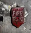 Melted fire alarm from an abandoned hospital [OC]